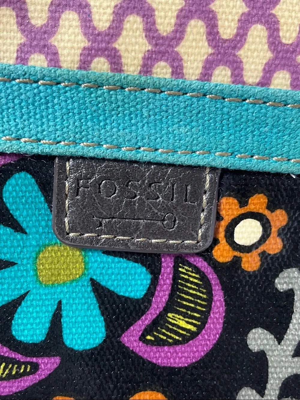 Fossil Black Floral Print Wristlet with Teal Trim